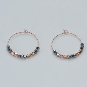 Rose gold hoop earrings with beads